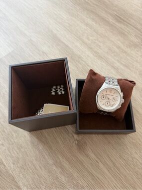 Michael Kors Women's Silver Stainless Steel Watch with Champagne Dial